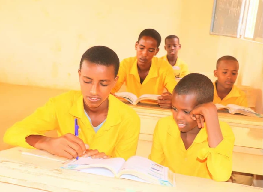 male student in classroom